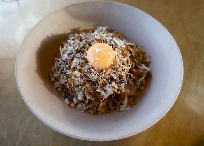 Smoked Wagyu tartare w/fermented chilli paste, cultured grains, mushrooms, sesame, seaweed, egg yolk ($28)