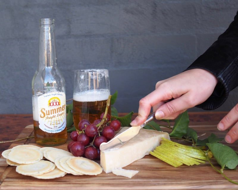 XXXX Summer Bright Ale Lager with asiago, colby or parmesan beer and cheese