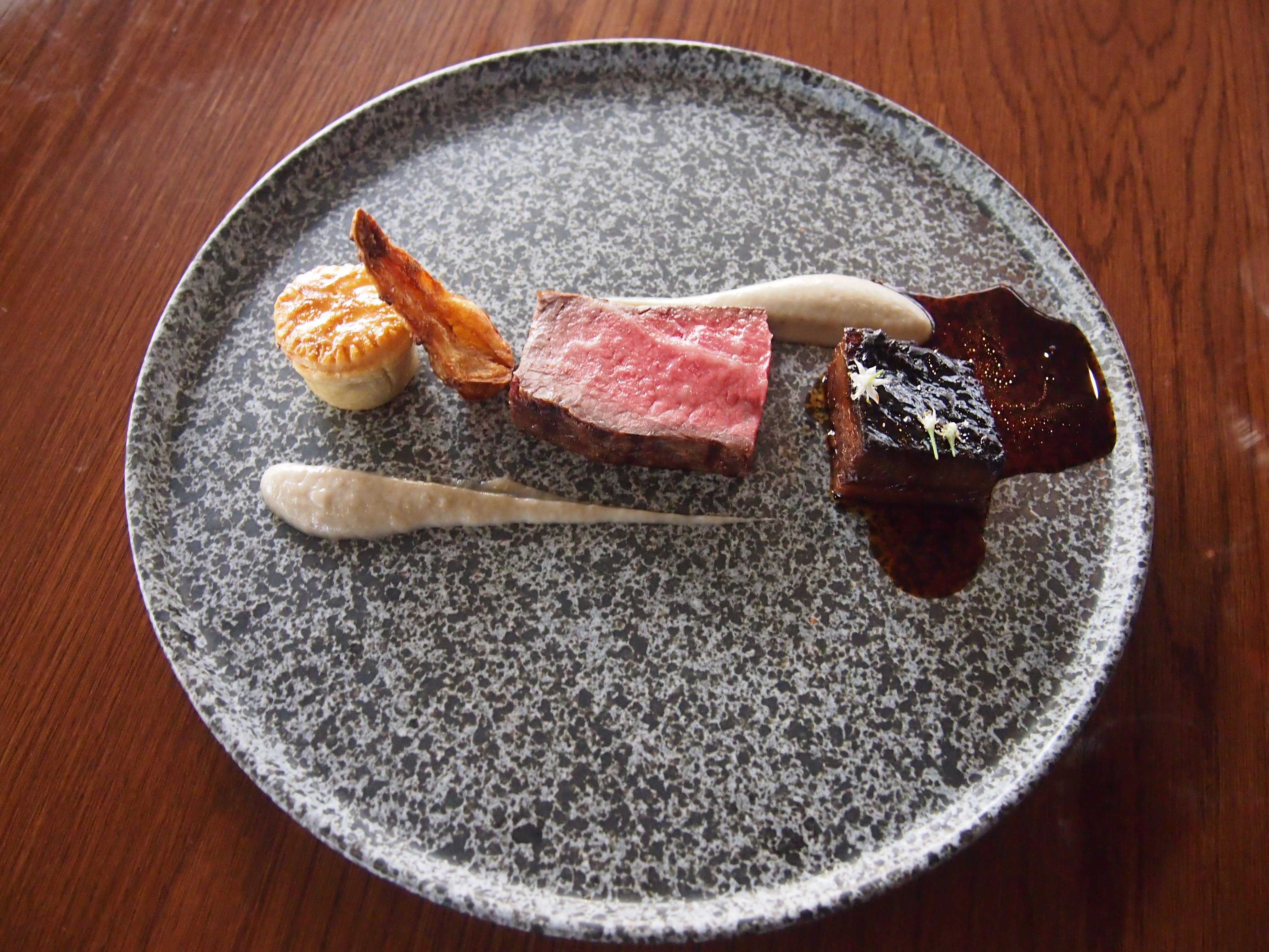 dutchess-roast-porterhouse-slow-roasted-brisket-sous-vide-cheek-pie-jus-artichoke