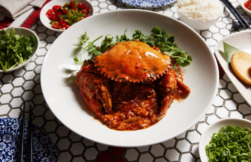 Fully dressed mud crab with sauce at Jinja Mud Crab Month