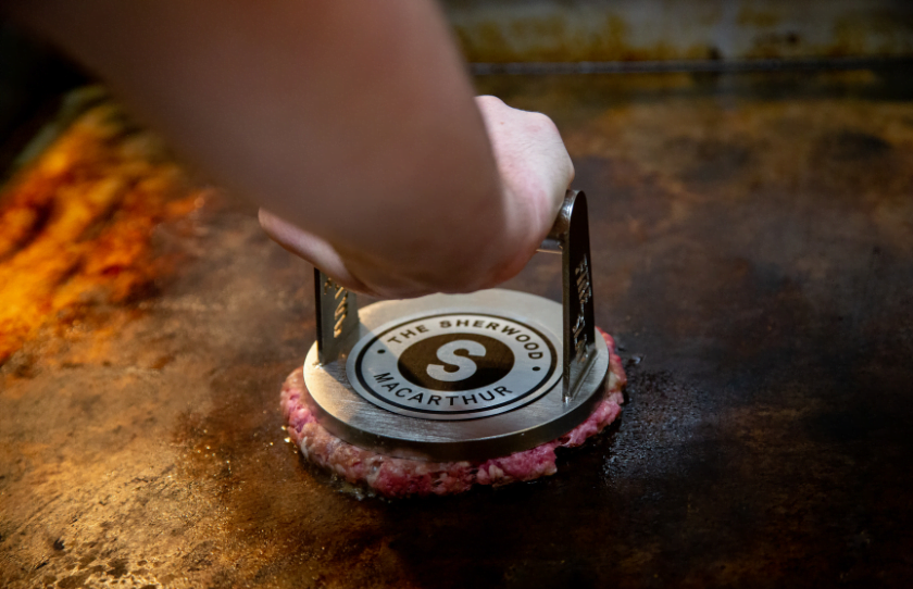 Smash burger being prepared at The Sherwood.