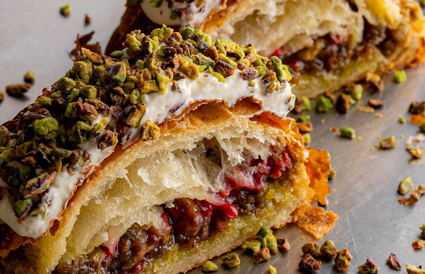 Pistachio praline and raspberry croissant. Pistachio frangipane, raspberry jam, whipped cheesecake and toasted pistachios at Shadow Baking.
