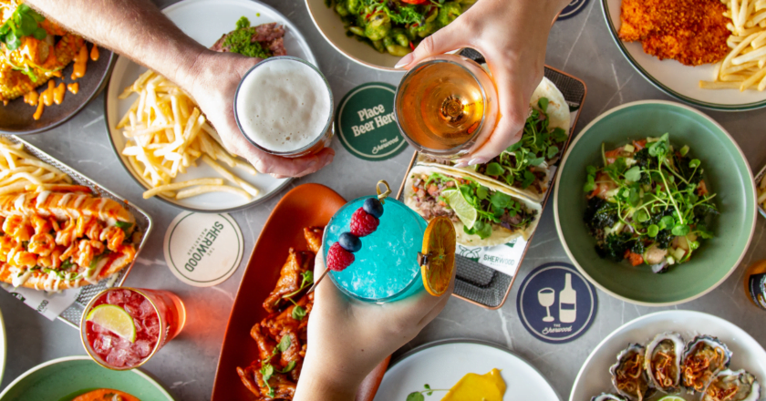Selection of burgers, chips and salad items from new Southwest Sydney pub The Sherwood.