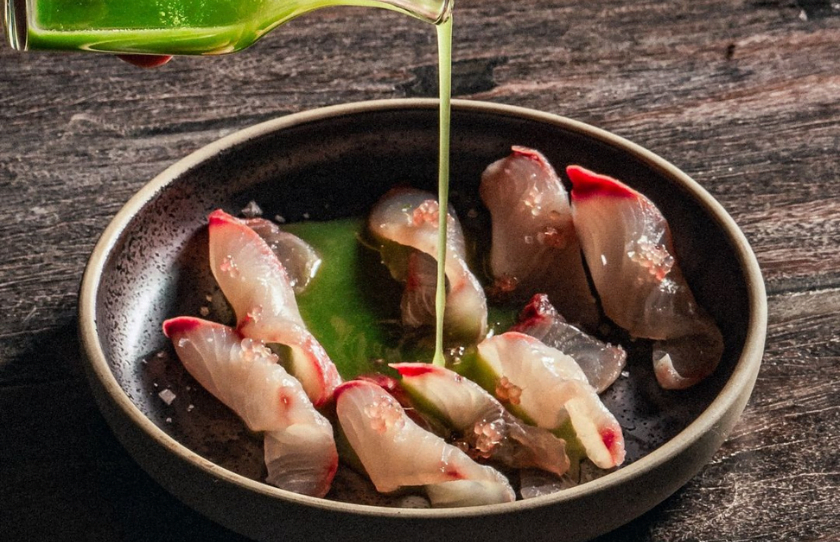 Ogni Ceviche with cured kingfish, green sauce (green mango, mint, chilli, mustard oil, ginger), finger lime and crunchy papadam