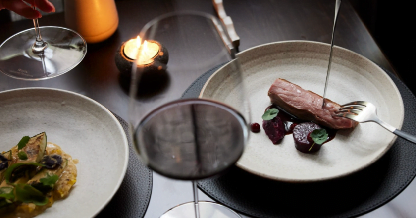 Meat dish and red wine at Le Salle Dining.