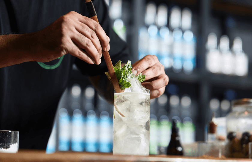 Hills Distilling Co making cocktail