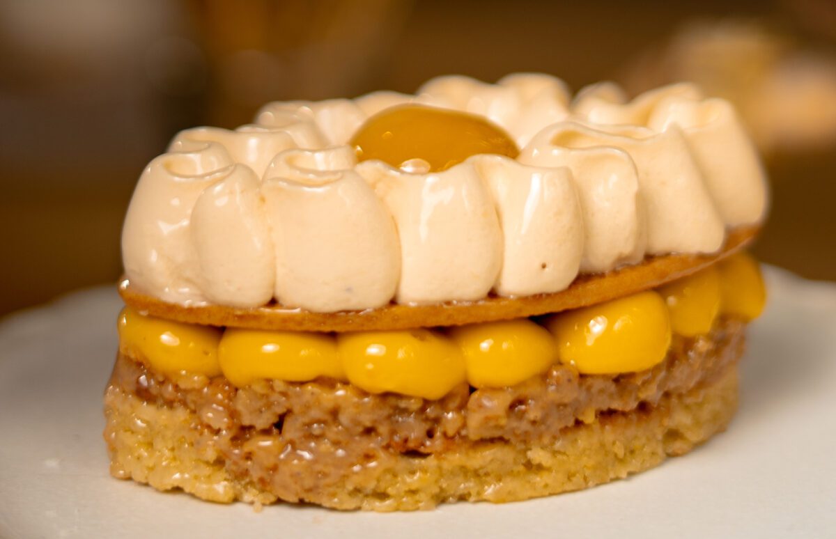 Sucre Du Jour Otto Tay - pastry with yellow and white cream and biscuit
