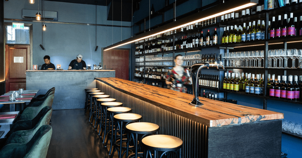 bartender behind the bar at Newtown's Flight Path